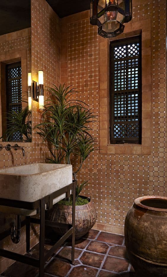 an image of a bathroom setting with tile on the walls and floor, along with potted plants, classique, zellige