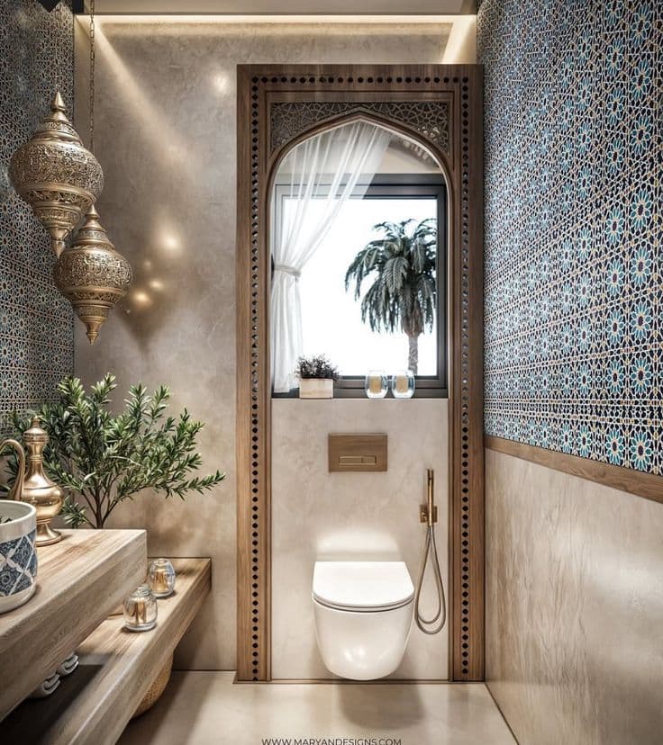 a bathroom with a toilet, sink and mirror on the wall next to potted plants, classique, tadelakt